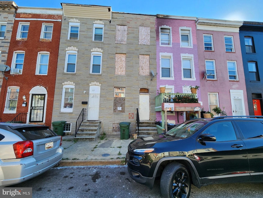 309 S Stricker St, Baltimore, MD 21223 - photo 1