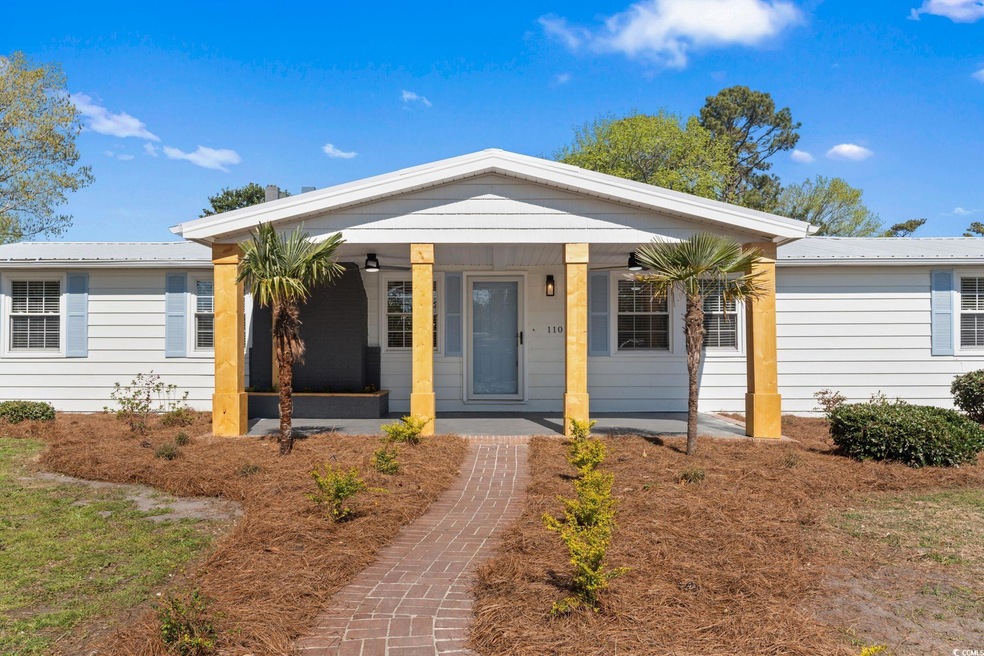 Ranch-style house featuring covered porch