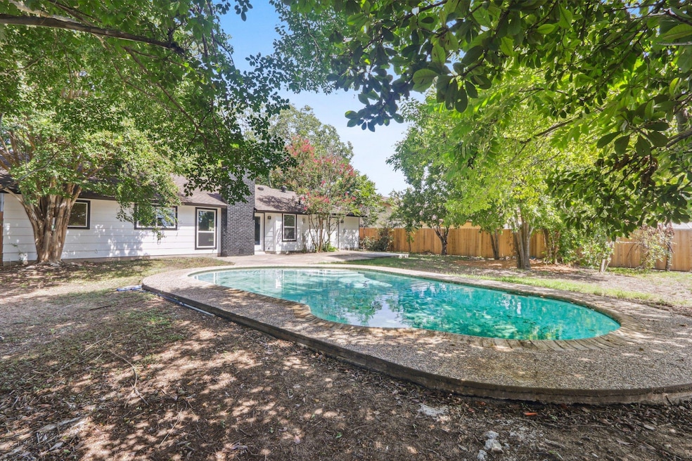 View of pool featuring a fenced backyard and a fenced in pool