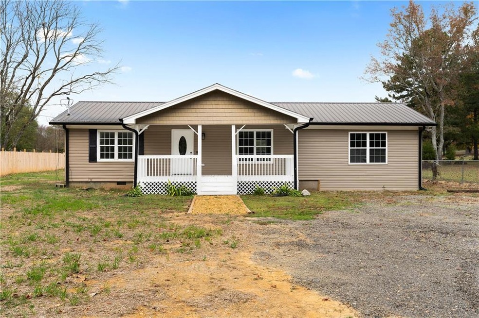 Single story home with a porch