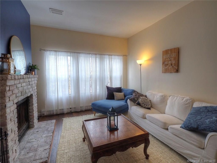 Sunken living room with fireplace