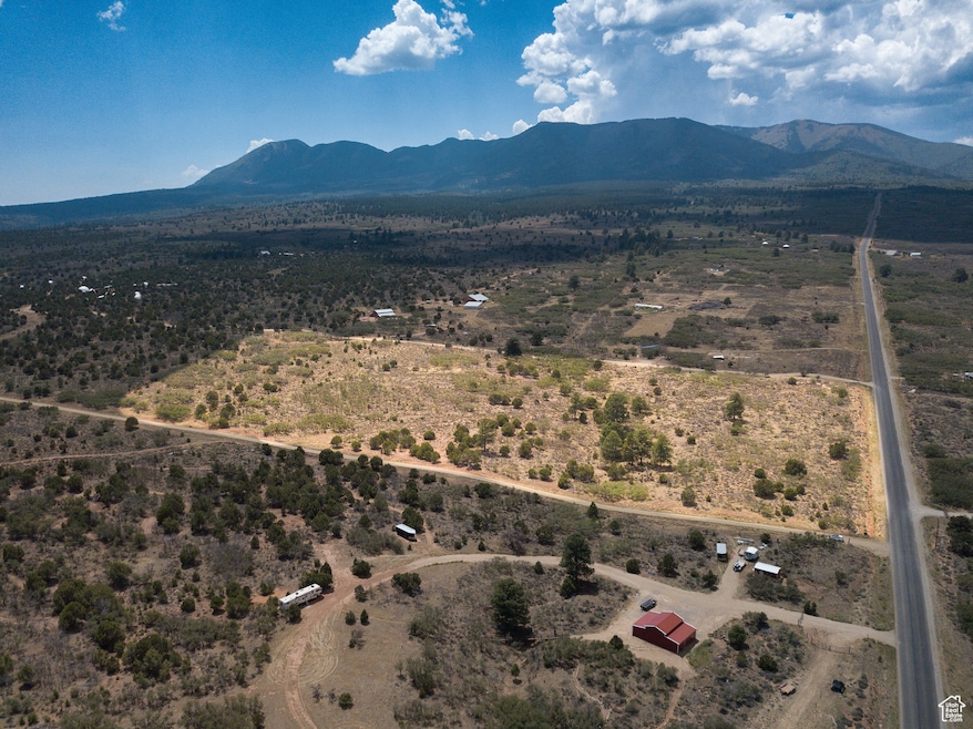 View of rural area with a mountain backdrop