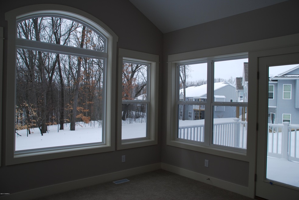 2531 Summit Ridge Dr NE unit 22, Grand Rapids, MI 49505 - photo 1