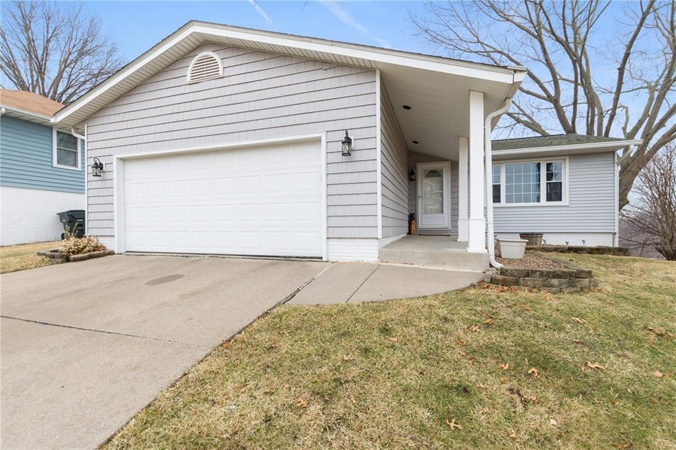 Front of home with a two car attached garage