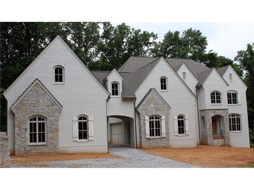 New Custom Built Porte-cochere home with a four ca