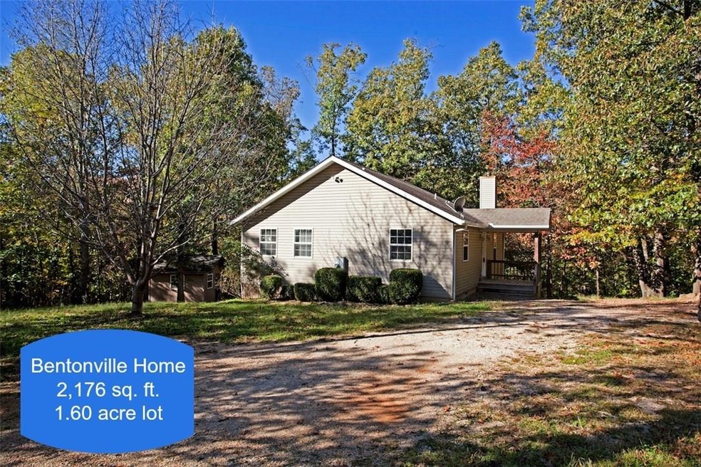 This fantastic home is located in Bentonville on a 1.60 acre lot!