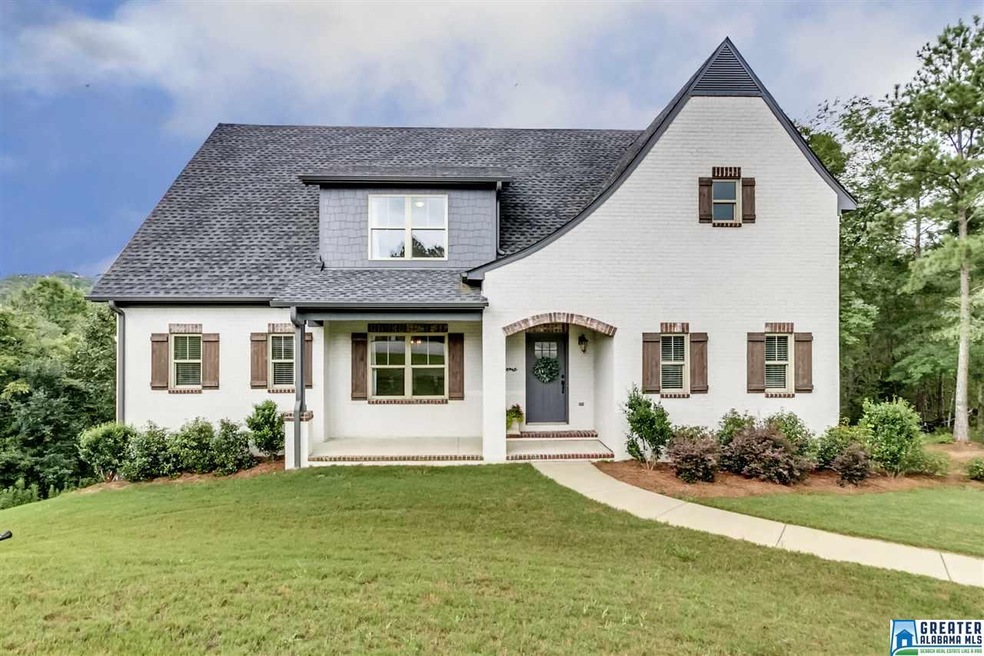 This lovely home is located in a cul-de-sac within