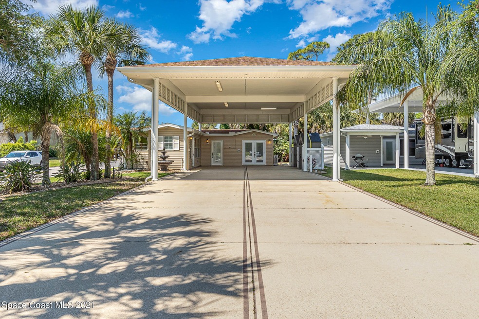 864 Plantation Dr, Titusville, FL 32780 - photo 1