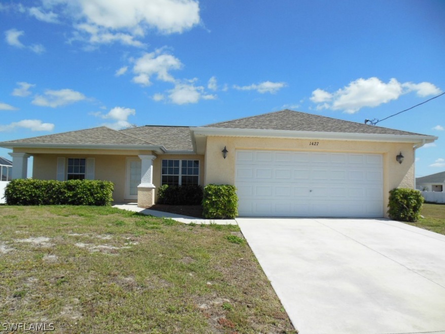 1427 NE Juanita Place, Cape Coral, FL 33909 - photo 1
