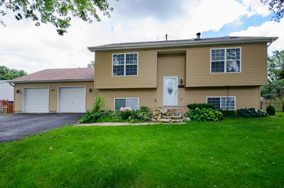 New Siding and Roof with a fully fenced in front a