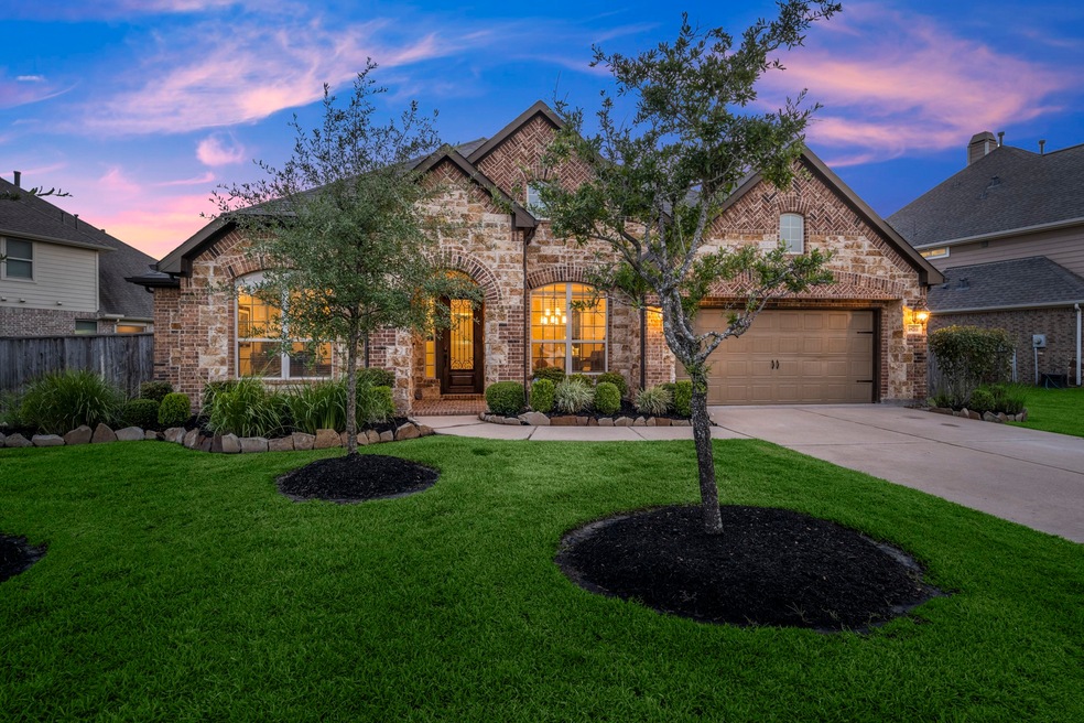 Timeless brick and stone exterior that enhances the curb appeal.