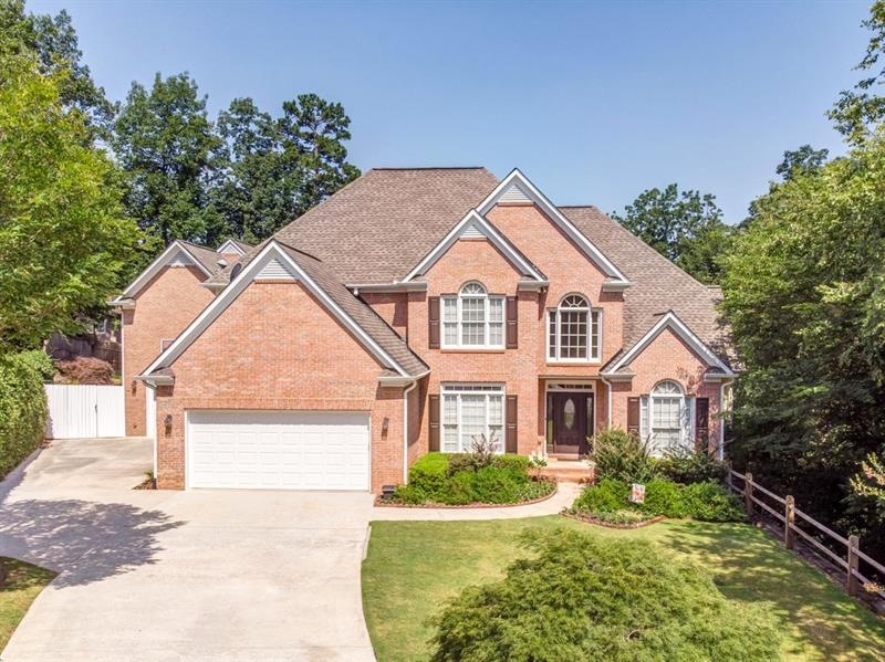 Stunning brick-front home with 3 car garage!