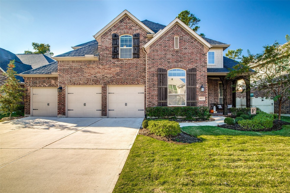 Impressive home, built by Highland Home!  Brick home with covered front porch and three-car, front loading garage!