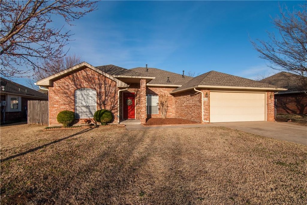 4112 Gyrfalcon Dr, Norman, OK 73072 - photo 1