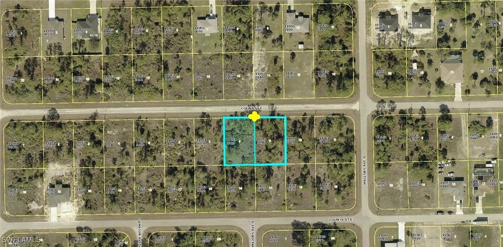 Aerial map of property and surrounding area with p