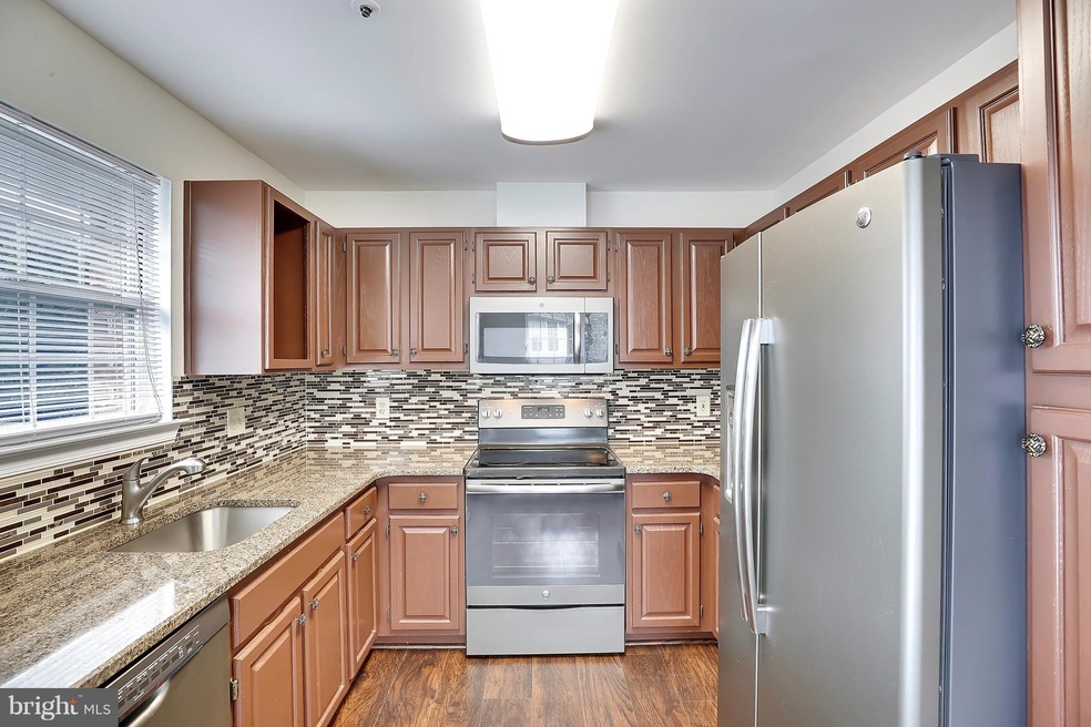 4406 Silverbrook Ln unit J301, Owings Mills, MD 21117 - photo 1