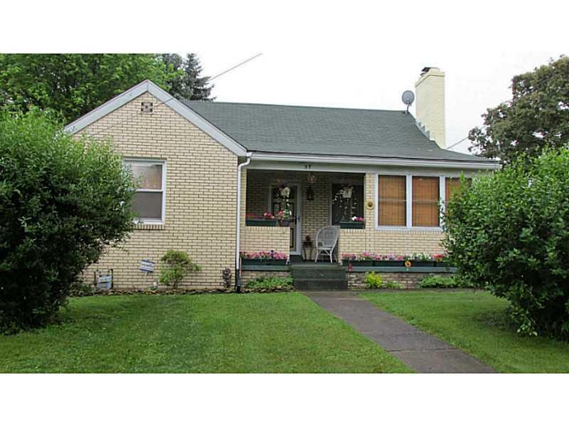 Exterior Front. Brick Cape Cod