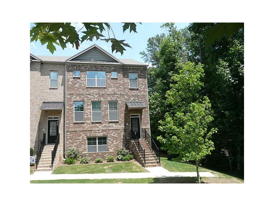 Exterior Front. AMAZING BRICK TOWNHOME WITH 2 CAR 