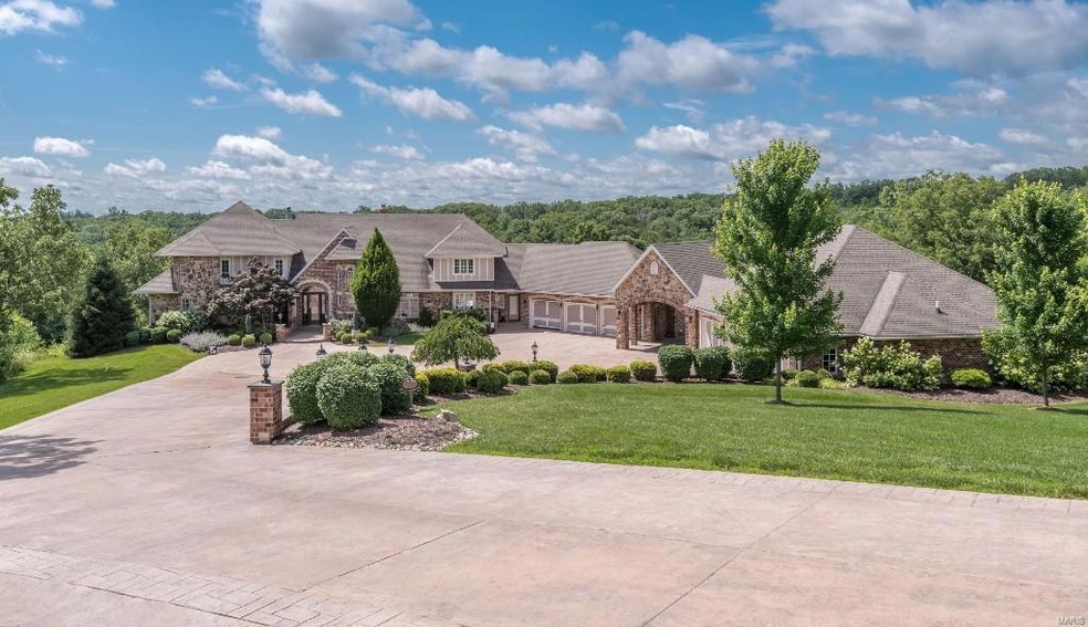Stunning 2 story home on 18.1 acres