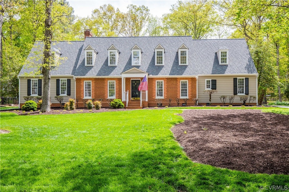 Lovely Cape with beautiful brick accent.
