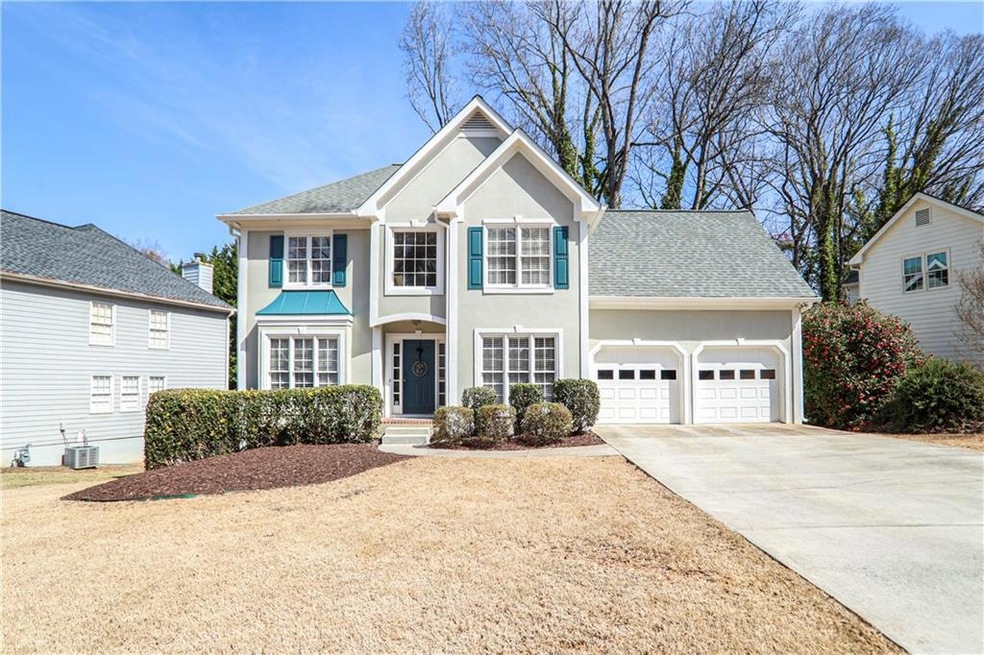 View of front of property with stucco siding, an a