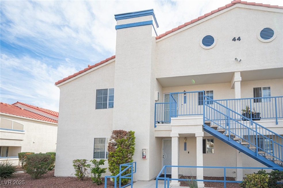View of building exterior featuring stairway