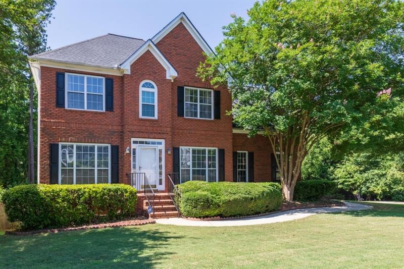 Beautiful 2-story brick front home with side entry