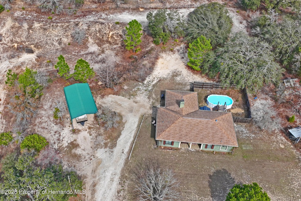 12404 Dolquieb Ln, Weeki Wachee, FL 34614 - photo 1