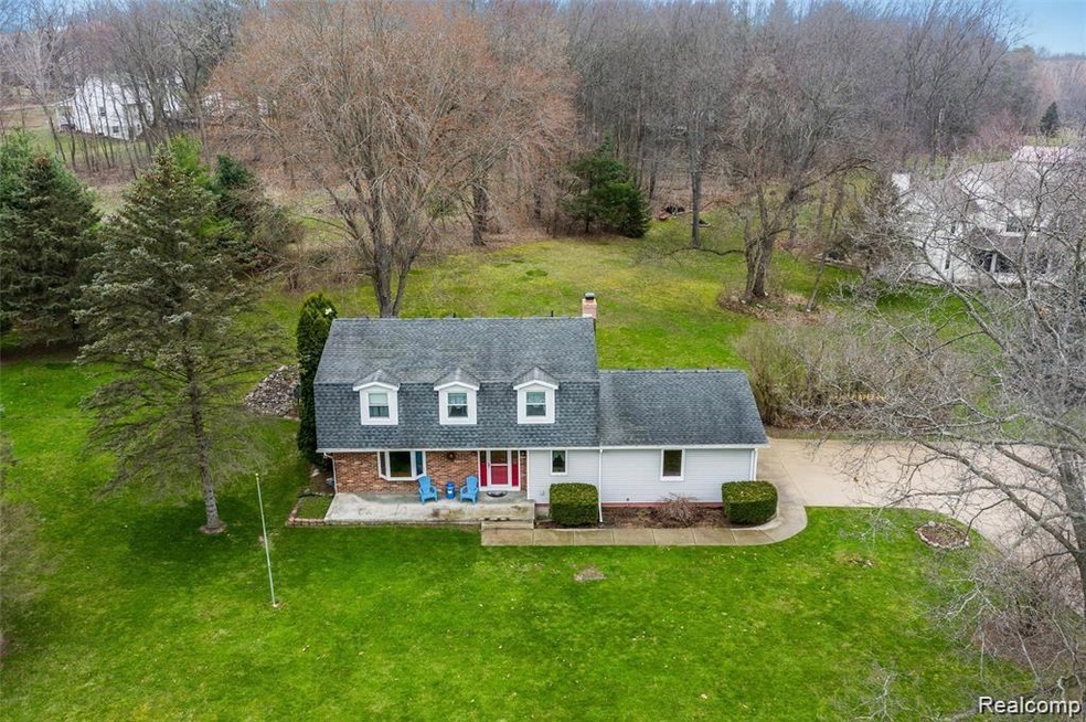 332 S Hacker Rd, Brighton, MI 48114 - photo 1