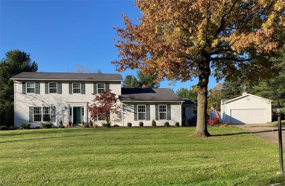 East Hudson Hills colonial on nearly one acre