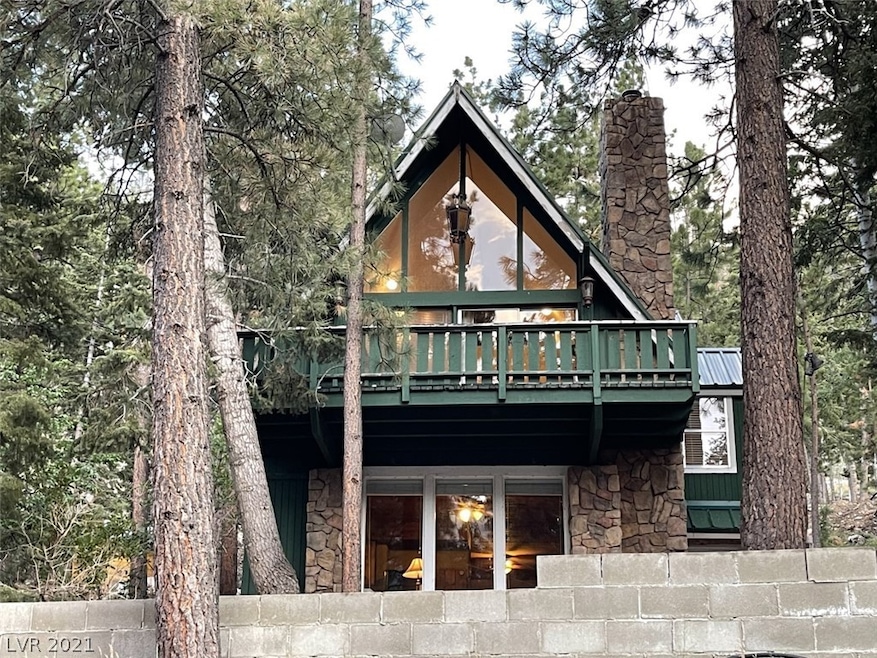 This enchanting A-frame chalet is situated on a ma