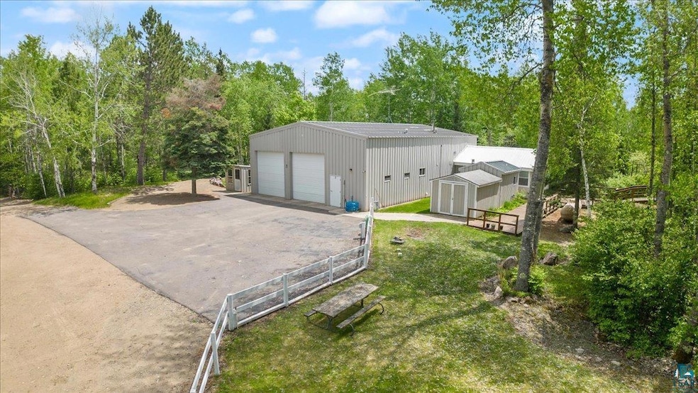 Exterior space with an outdoor structure, a lawn, 