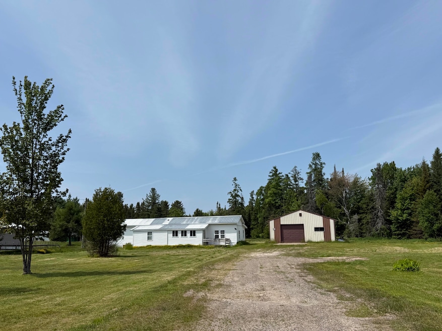 6276 W 6 Mile Rd, Brimley, MI 49715 - photo 1