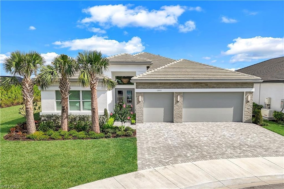 View of front of home featuring a garage and a fro