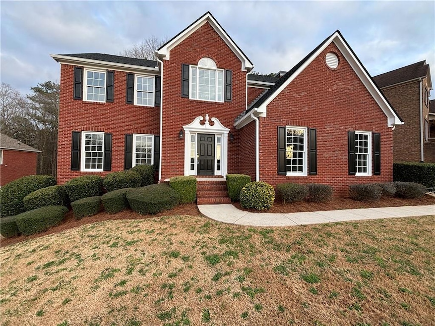 View of front of property with a front yard