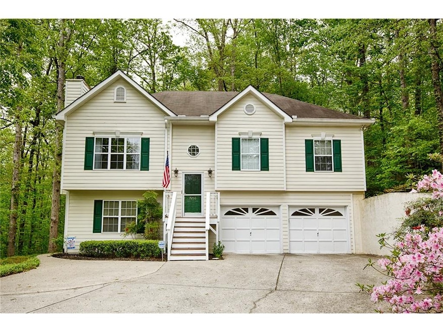 Property is on large wooded lot. Maintenance free 