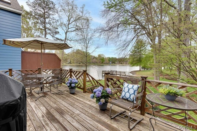 Custom deck with chippendale railing and gate with