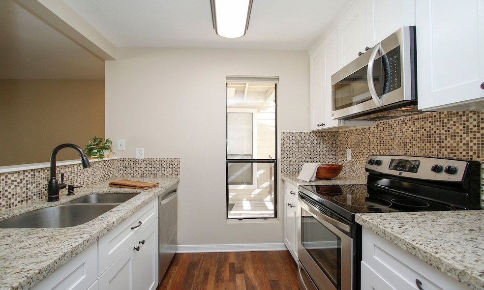 Welcome to this beautifully updated condominium in
