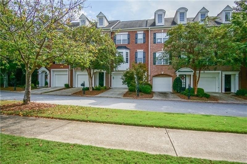 GORGEOUS TWO-STORY TOWNHOME IN SOUGHT-AFTER GATED 