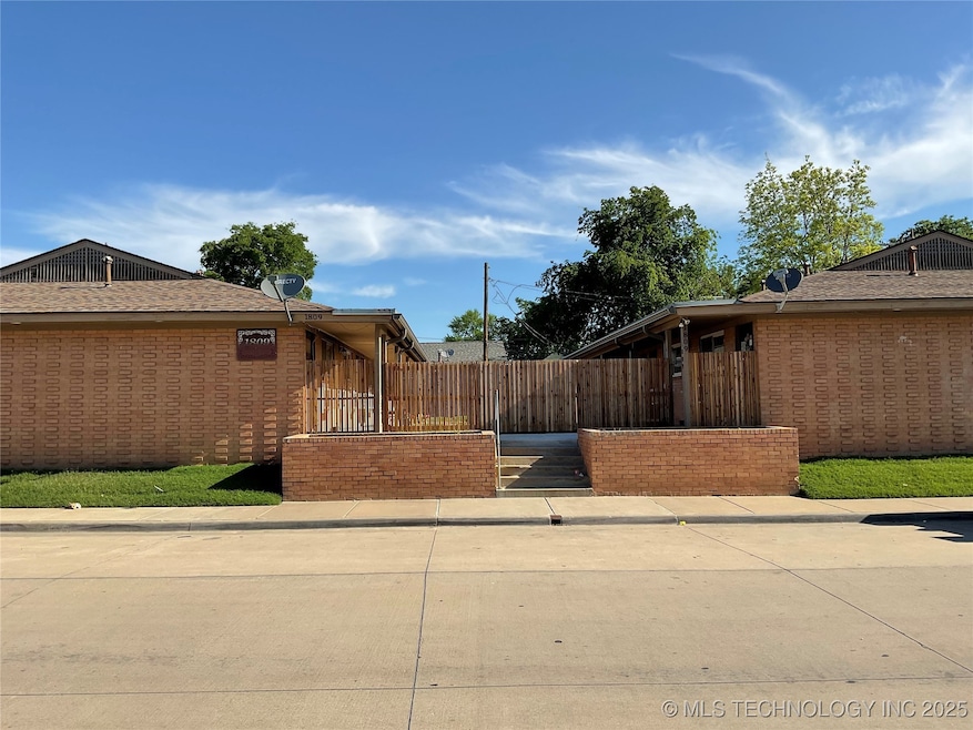 View of side of property with fence