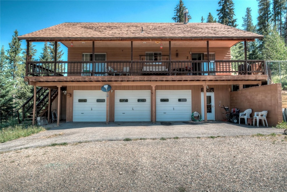 Exterior: 3 car garage, large wrap around deck.
