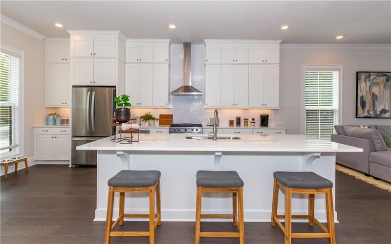 Kitchen featuring Staked Cabinets *Photos shown ar