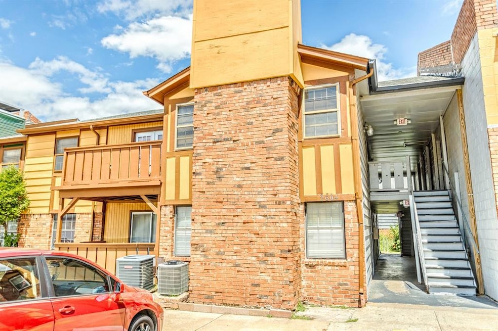 View of property featuring central AC unit