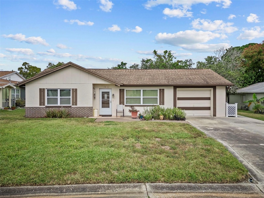 12818 Willowdale Way, Hudson, FL 34667 - photo 1