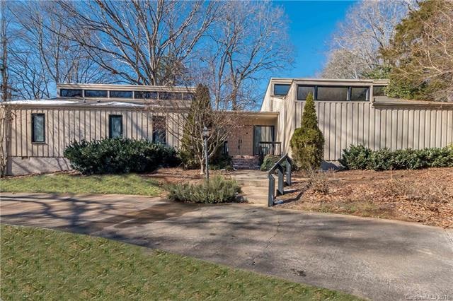 Front of house with circular driveway