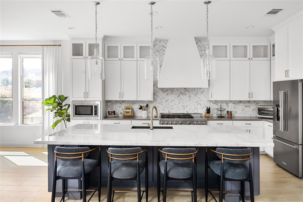 Stunning Remodeled Kitchen with Floor to Ceiling Cabinets