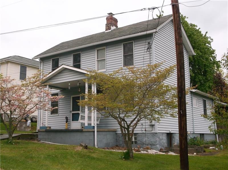 Welcome to 209 CYPRESS STREET!  Located on a large