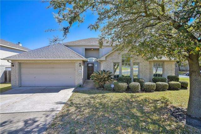 Welcome Home! 3 sided brick home with 2 car garage