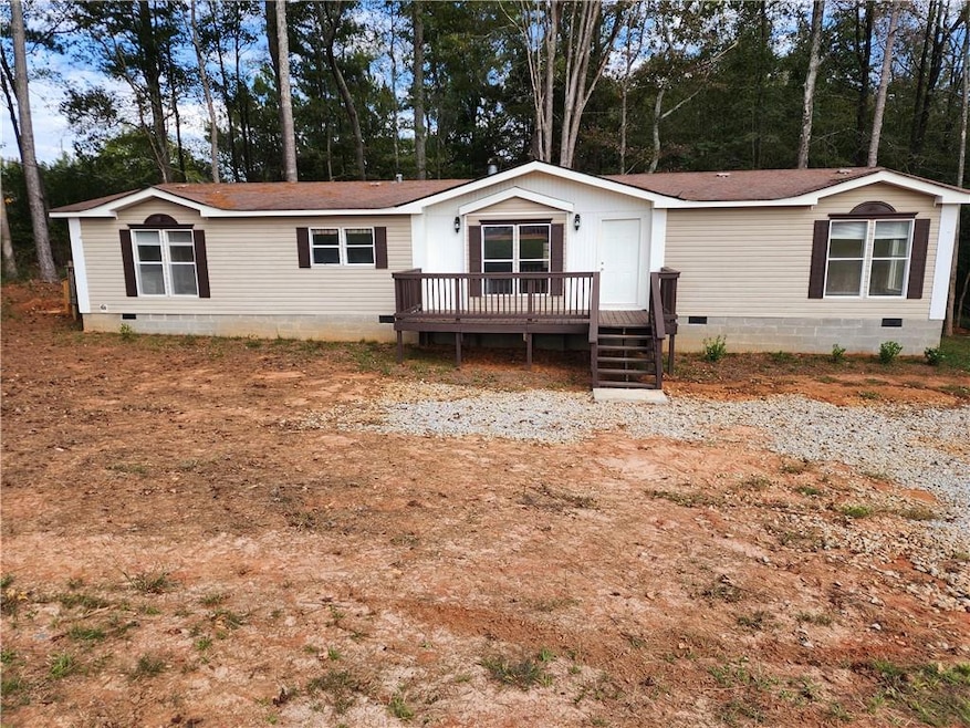 View of front facade featuring a deck