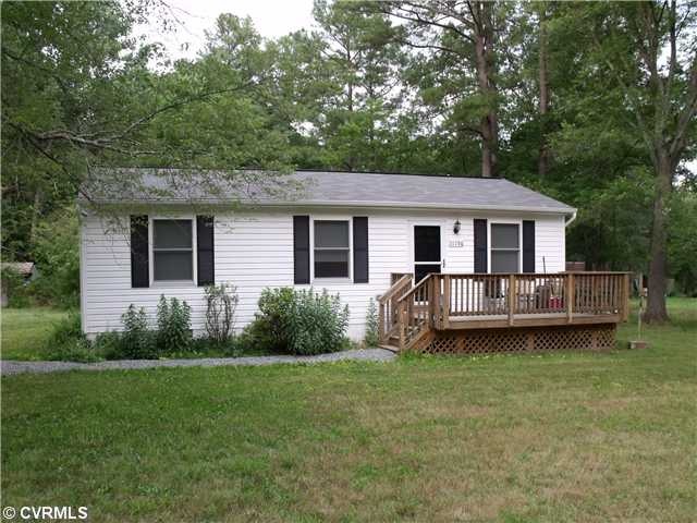 Exterior Front - 120 square foot deck on front.  q